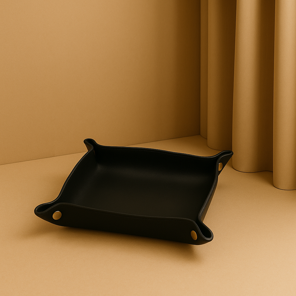 black leather tray standing in beige golden backround