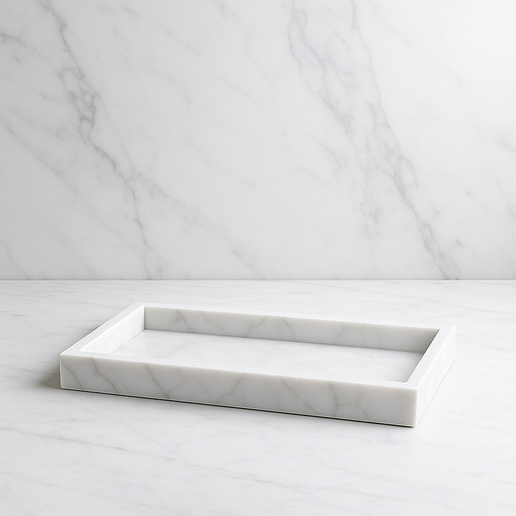 Rectangular white marble tray with subtle grey veining, displayed on a matching marble surface
