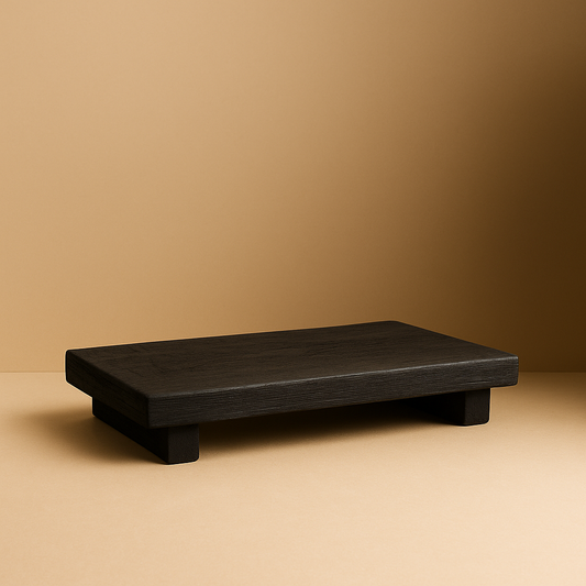 black wooden tray standing on beige surface 
