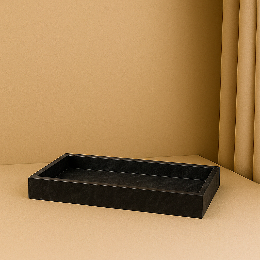 black marble tray standing in beige golden background 